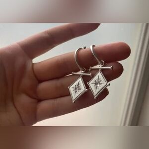 Chic Silver Dangle Earrings with Star Design